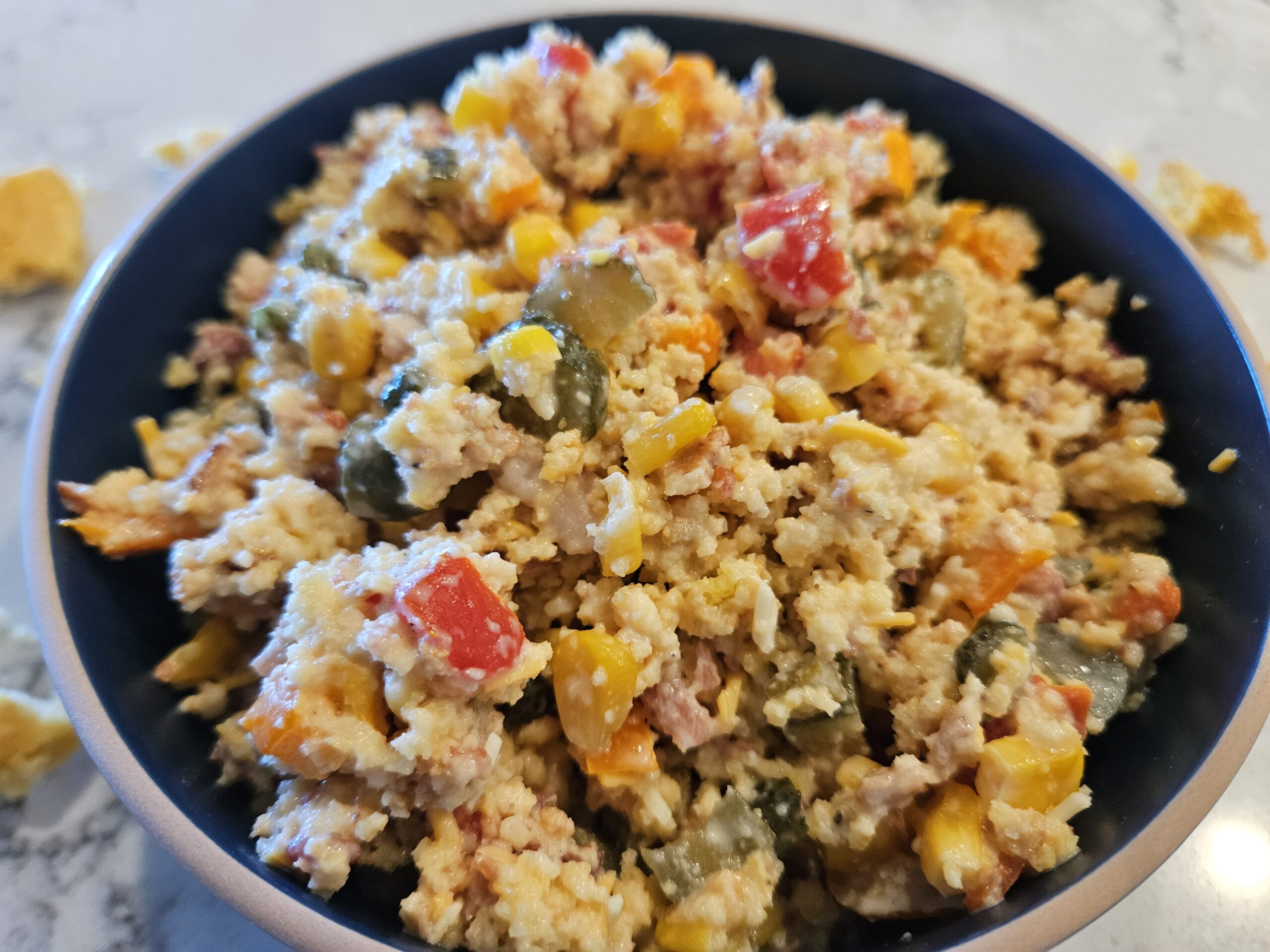 photo of a bowl of cornbread salad and a recipe for an easy side dish