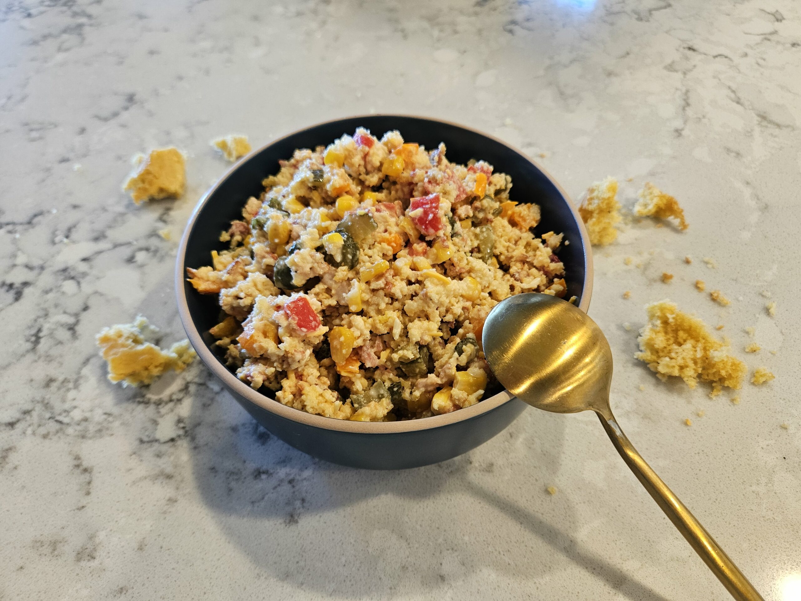 photo of a bowl of cornbread salad and a recipe for an easy side dish